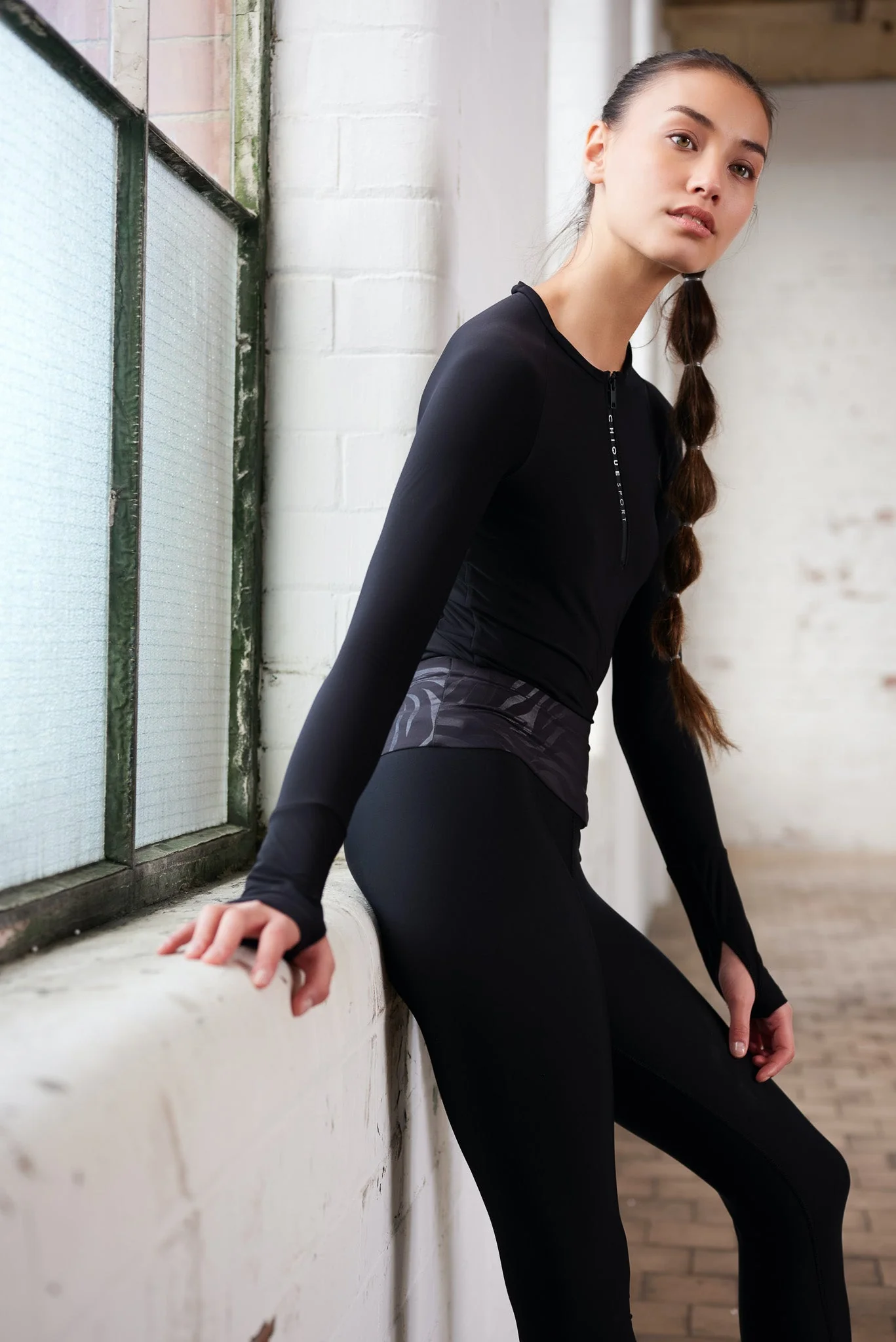 Iconic Half-Zip Top in Black - Image 15