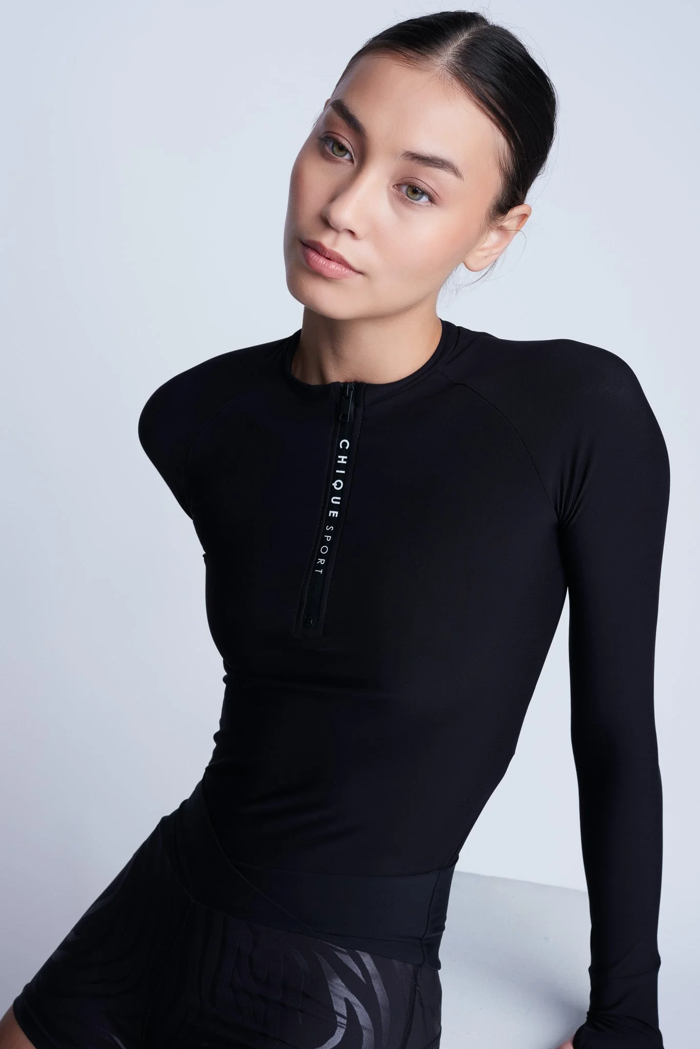 Iconic Half-Zip Top in Black - Image 23